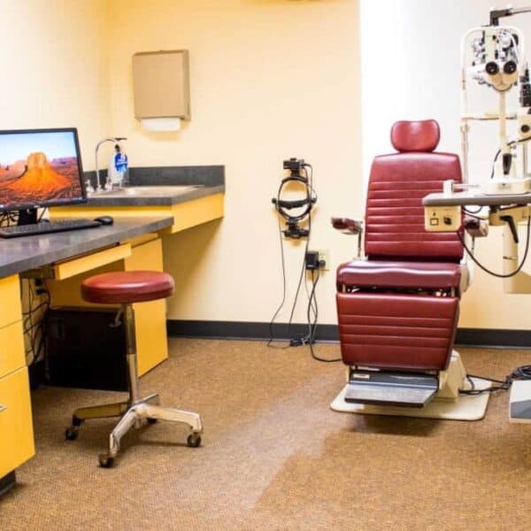 Optometry exam room with chair and equipment