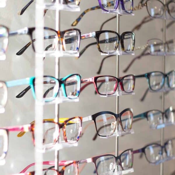 Clear racks full of women's glasses