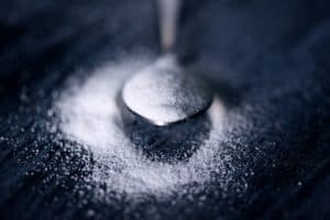 Silver spoonful of white sugar